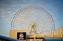 ferris wheel against blue sky