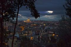 View from Pincio Terrace over night-time Rome towards St. Peter's Basilica