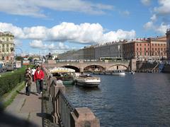 Anichkov Bridge in Saint Petersburg during daytime with statues and ornate railings