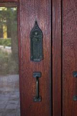 Detail of a door finger plate at the Gamble House in Pasadena