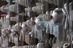 Rows of seated Buddha statues at Gangaramaya Temple, Colombo