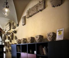 Interior view of Casa Museo Ivan Bruschi with a display of 12th-century Southern Italy capitals