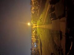 Night view of a city from the Khwaja Khizr Tomb.