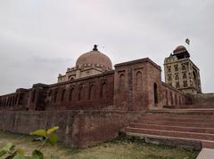 Side view of tomb and entrance walls