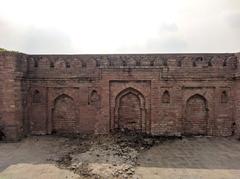 Walls of an ancient tomb with distinctive architectural features