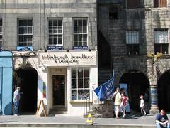 Entrance of Gladstone's Land with a hanging 'gled' ornament above