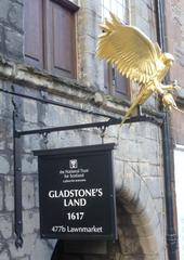 Entrance sign at Gladstone's Land in Lawnmarket Edinburgh