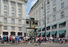 Ankeruhr in Vienna at 12 o'clock with gathered tourists