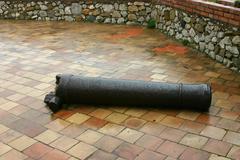 Broken cannon at Castelo de Castelmola in Italy