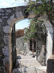 Entrance arch and staircase to Castello di Mola