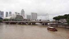 Bumboat on Singapore River near Esplanade Bridge