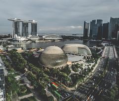 Esplanade in Singapore during sunset with city skyline and waterfront