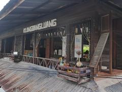 Khlong Bang Luang floating market with vendors and boats