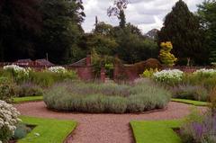 walled garden at Winterbourne with lush green shrubs and pathway