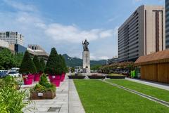 Gwanghwamun Plaza with statue of Admiral Yi Sun-sin and Bugaksan mountain in Seoul