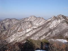 sunset view of Gyeryongsan mountain with colorful sky and misty landscape