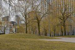 HTO Park at Downtown Toronto with people relaxing on the grass