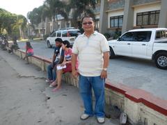 Mayor Jose Angelo M. Dominguez in front of a building in Castillejos, Zambales