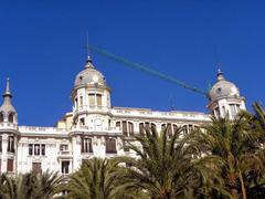 Alicante cityscape with buildings, mountains, and the coast