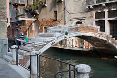 Venice street scene by a canal