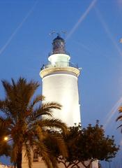 La Farola de Málaga lighthouse at dusk