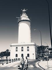 Lighthouse at Málaga's harbor promenade