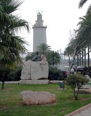 Memorial to Jorge Guillen with Malaga Lighthouse in the background