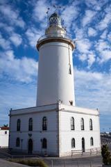 La Farola de Málaga lighthouse with blue sky background