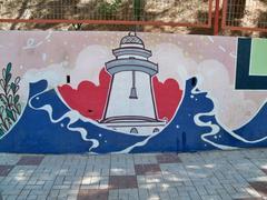 Mural at Rafael Alberti School featuring biodiversity, sustainable mobility, and landmarks of Málaga