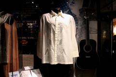 1997 Johnny Cash Signature Martin D-42 guitar, white shirt, June Carter's clothing, funeral program and poem