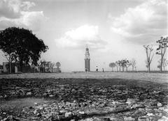 Children playing football in front of Torre Monumental in Retiro, Buenos Aires, 1932