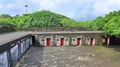 Cihou Fort with traditional Chinese red tile structures on Cihou Mountain