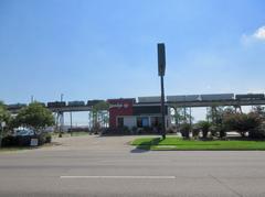 Clearview Parkway in Elmwood, Louisiana with freight train on rail ramp leading to Huey P. Long Bridge