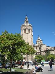 Plaza de la Reina in Valencia with historical buildings and a bell tower