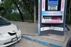 Electric car in public charging station at Parque España in Mexico City