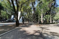 Parque España in Mexico City on a sunny day with green areas and people enjoying leisure activities