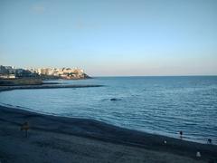 View of Ceuta coastal city at sunrise with the sea and buildings