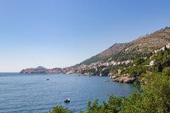 A distant view of Divovici Beach and the Old Town of Dubrovnik, Croatia