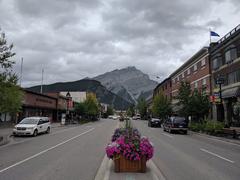 scenic view of Banff town with mountains in the background