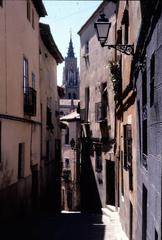 panoramic view of Toledo, Spain at dusk with historic buildings and the Tagus River