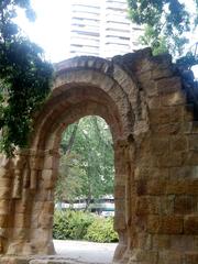 Ermita de San Pelayo y San Isidoro entrance gate with triple arch and worn jambs