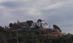 Saint Mary Magdalene hermitage and Castell Vell castle during Romería de les Canyes pilgrimage in Magdalena festival, Castelló de la Plana