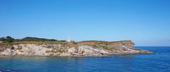 Cabo Mayor Lighthouse against a cliff in Santander, Spain