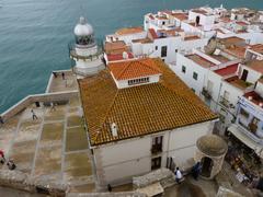 Peñíscola lighthouse with a clear blue sky