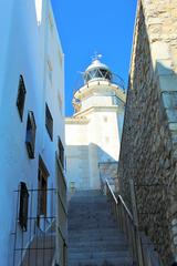 typical street in Peñíscola with Papa Luna Castle in the background