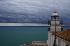 Casa del faroner i far at Peníscola during a storm