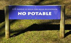 sign warning that gardens are watered with reclaimed water at Faunia in Madrid, Spain