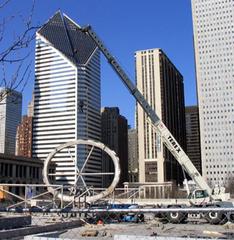 construction crews working on Cloud Gate