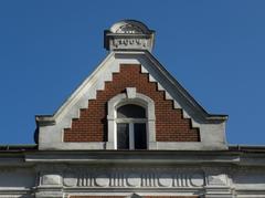 Historic building in Purkersdorf, Austria, with pharmacy sign from 1904