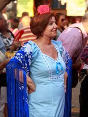 Chulapa dancing at Fiestas de la Virgen de la Paloma in Madrid